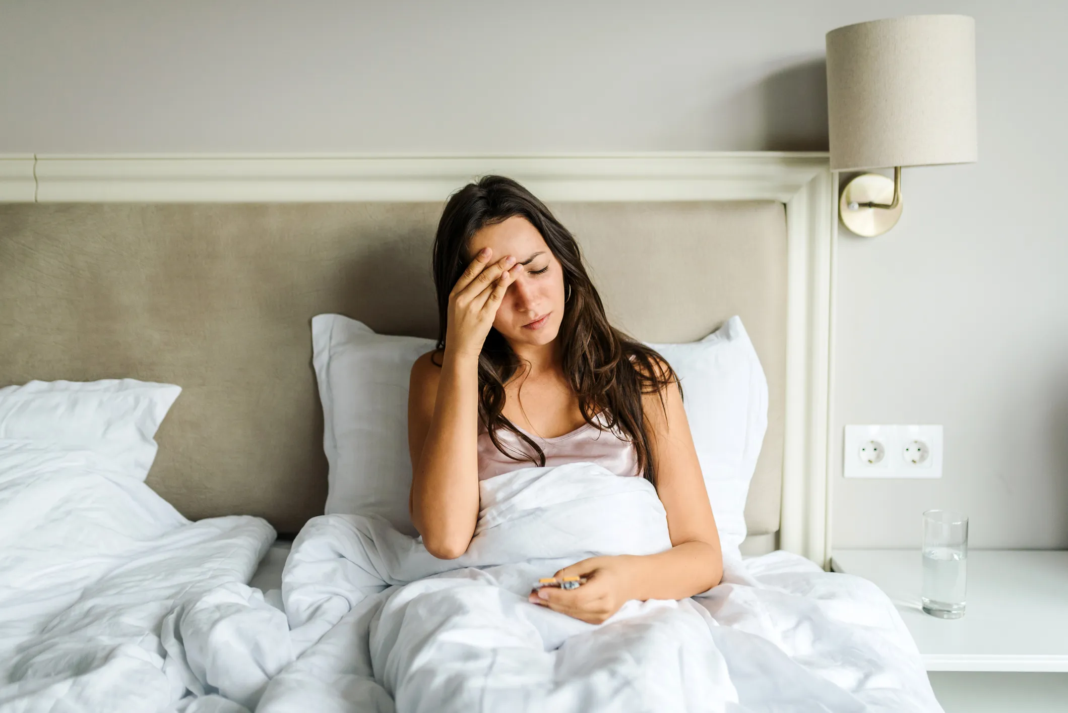 inflammaging infiammazione cronica donna a letto
